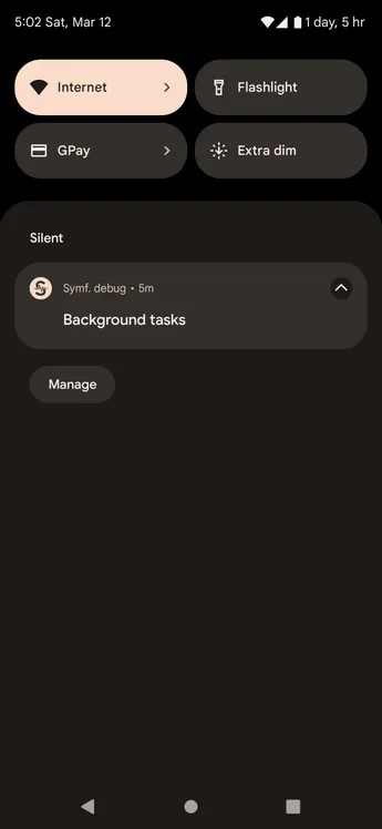 Android notification shade showing a Symfonium background task notification